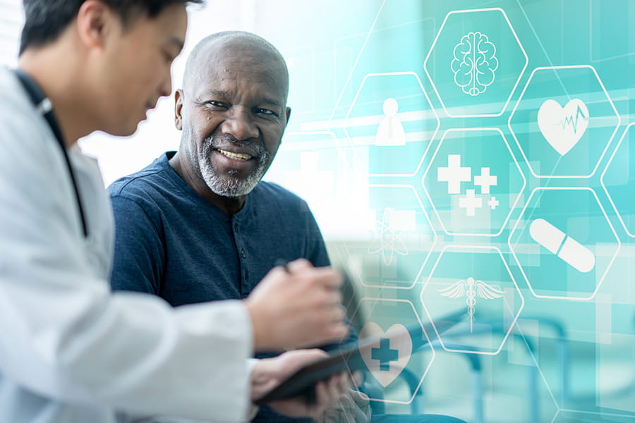 A man talking about his health with a doctor.