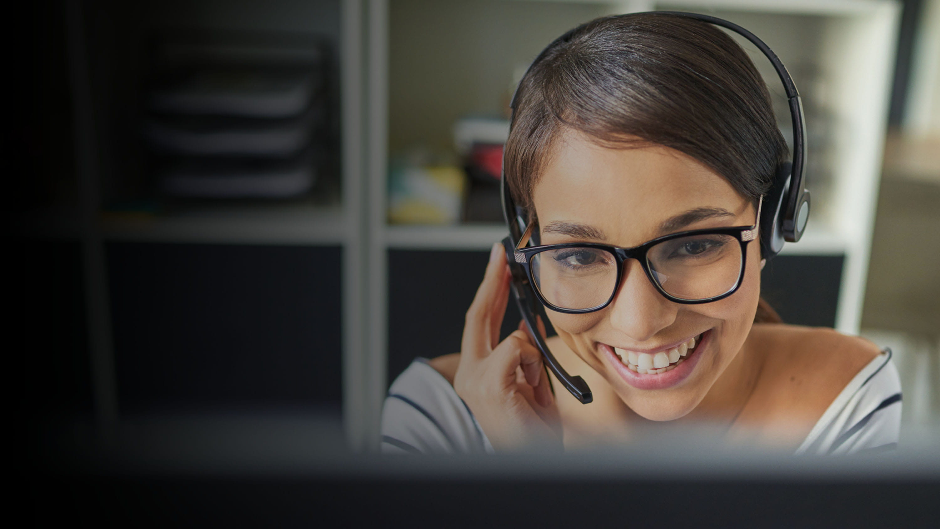 Woman talking on a headset 