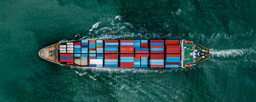 A cargo ship sailing.