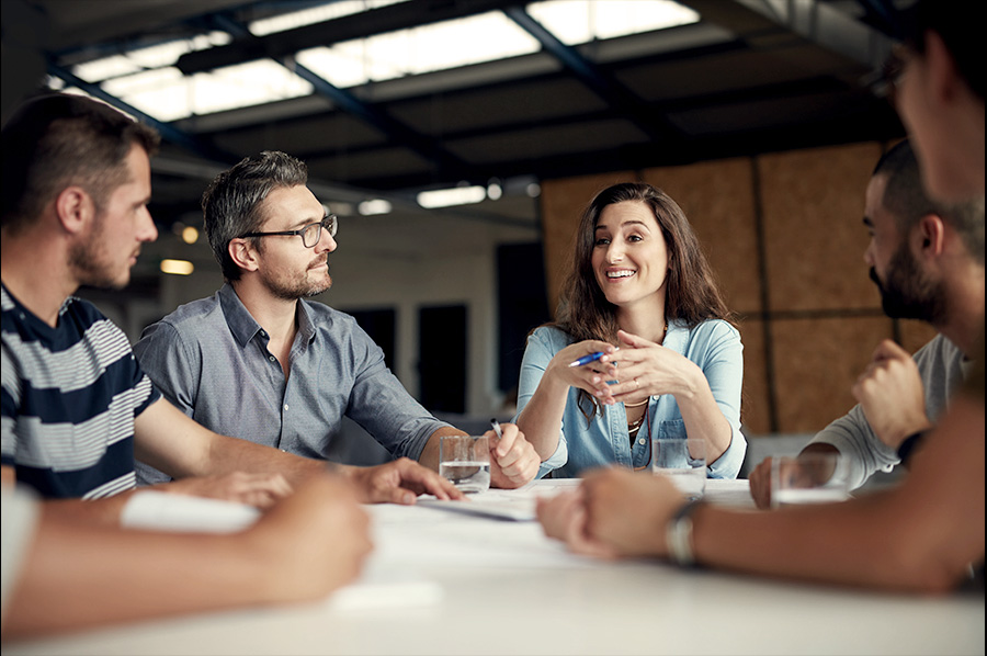 People in a meeting talking to one another
