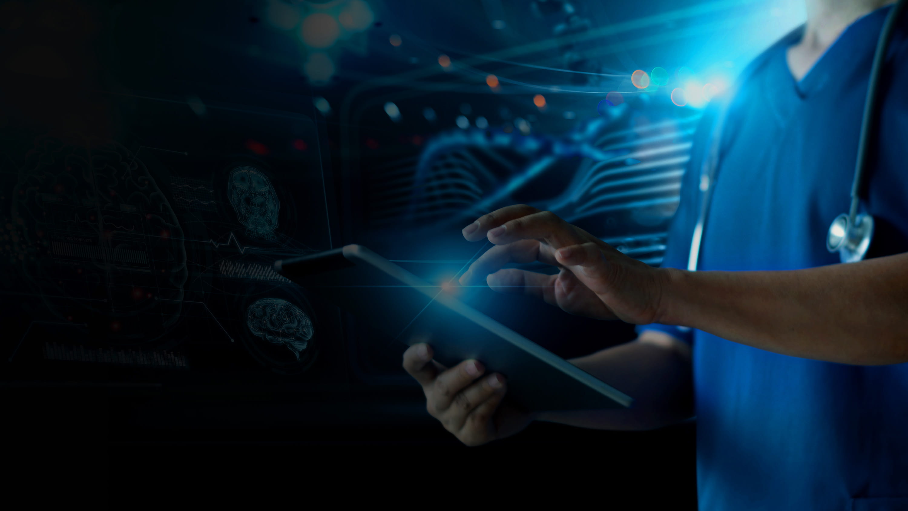 Medical professional on tablet.