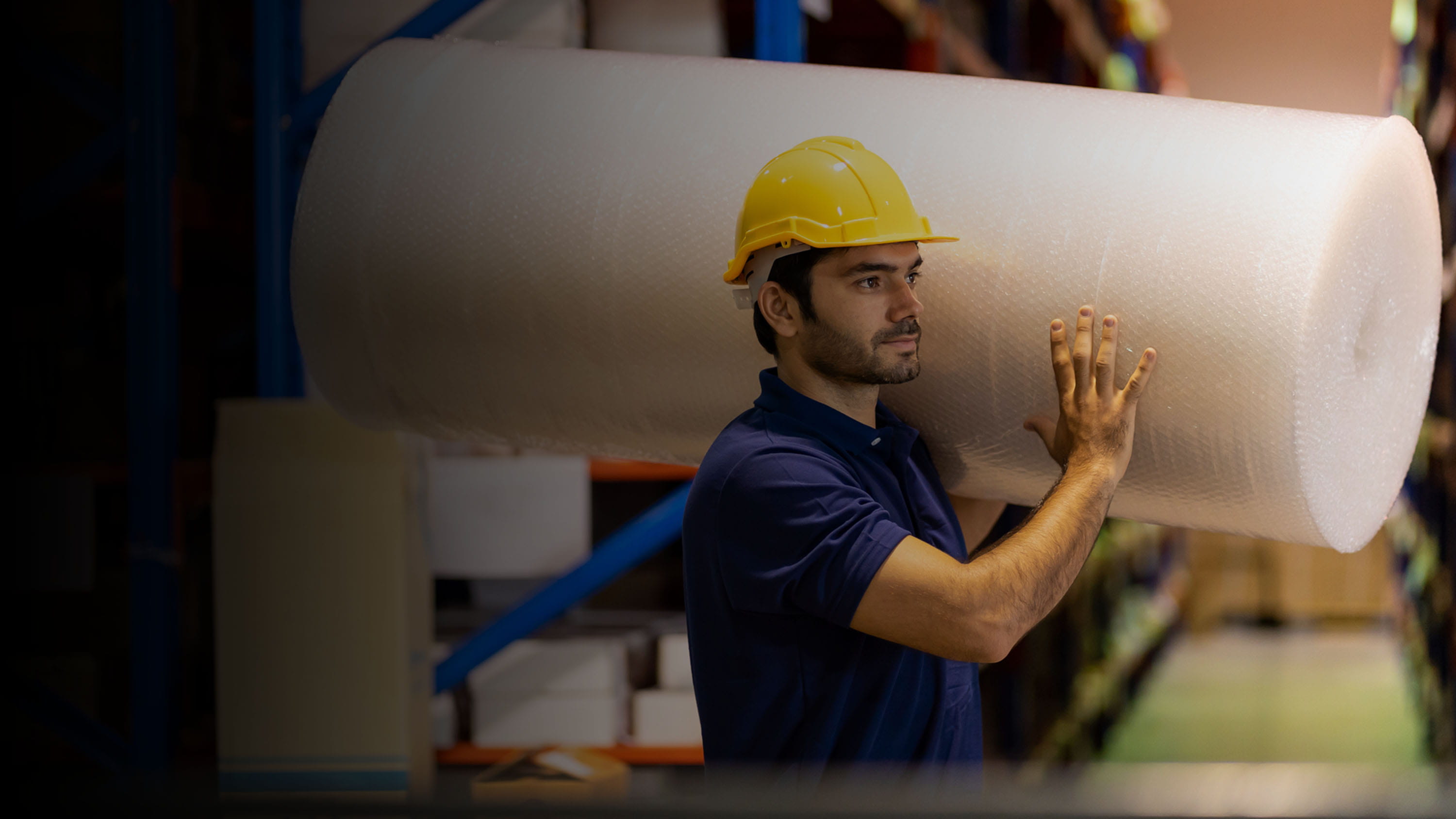 Man holding packaging material