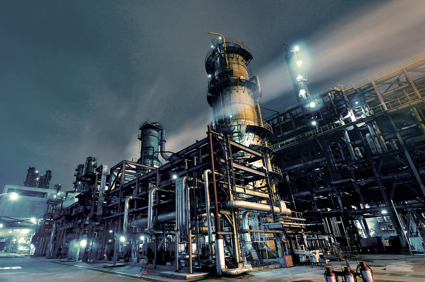 A large powerplant at night.