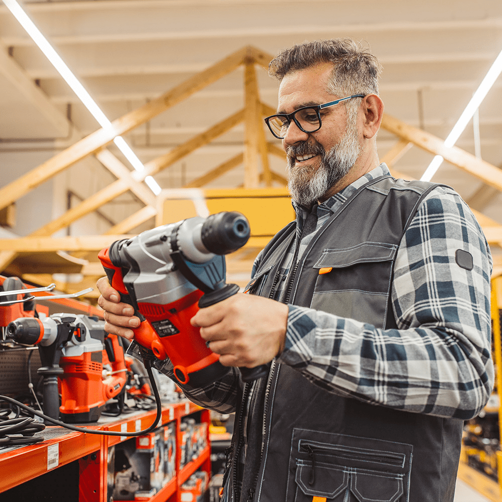 A man shopping for a new drill.