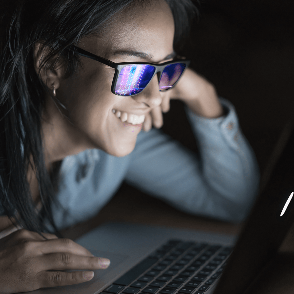woman looking at computer screen
