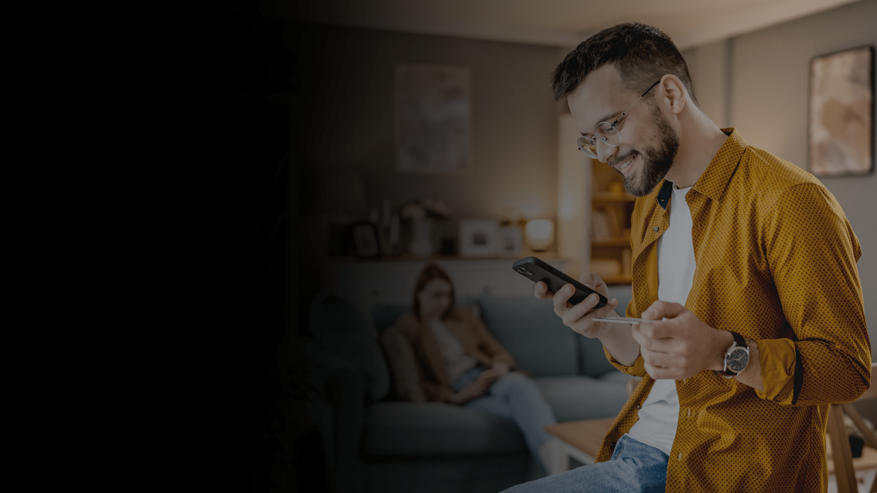 Man using a phone to online shop.