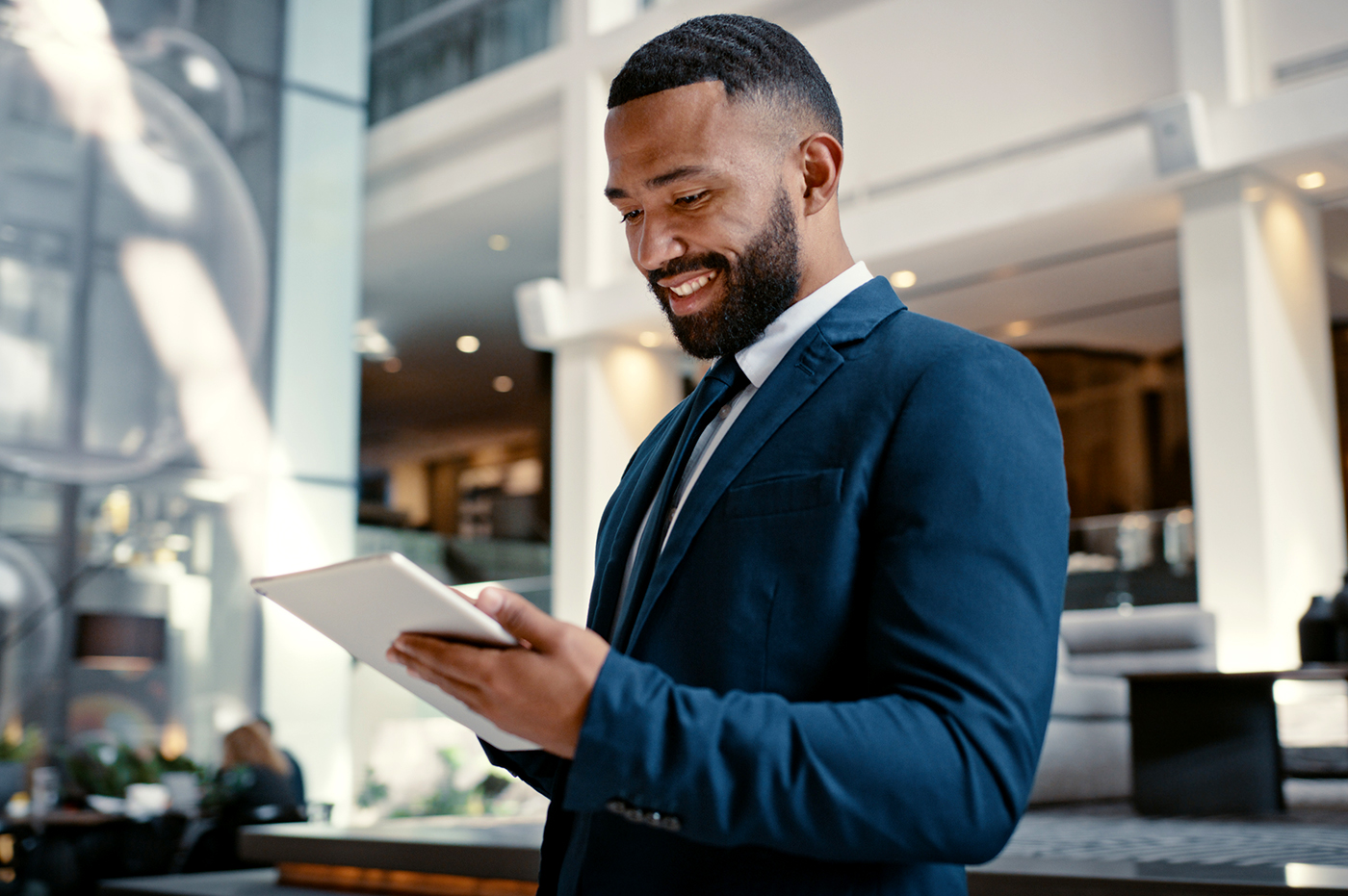 A banker using a tablet.